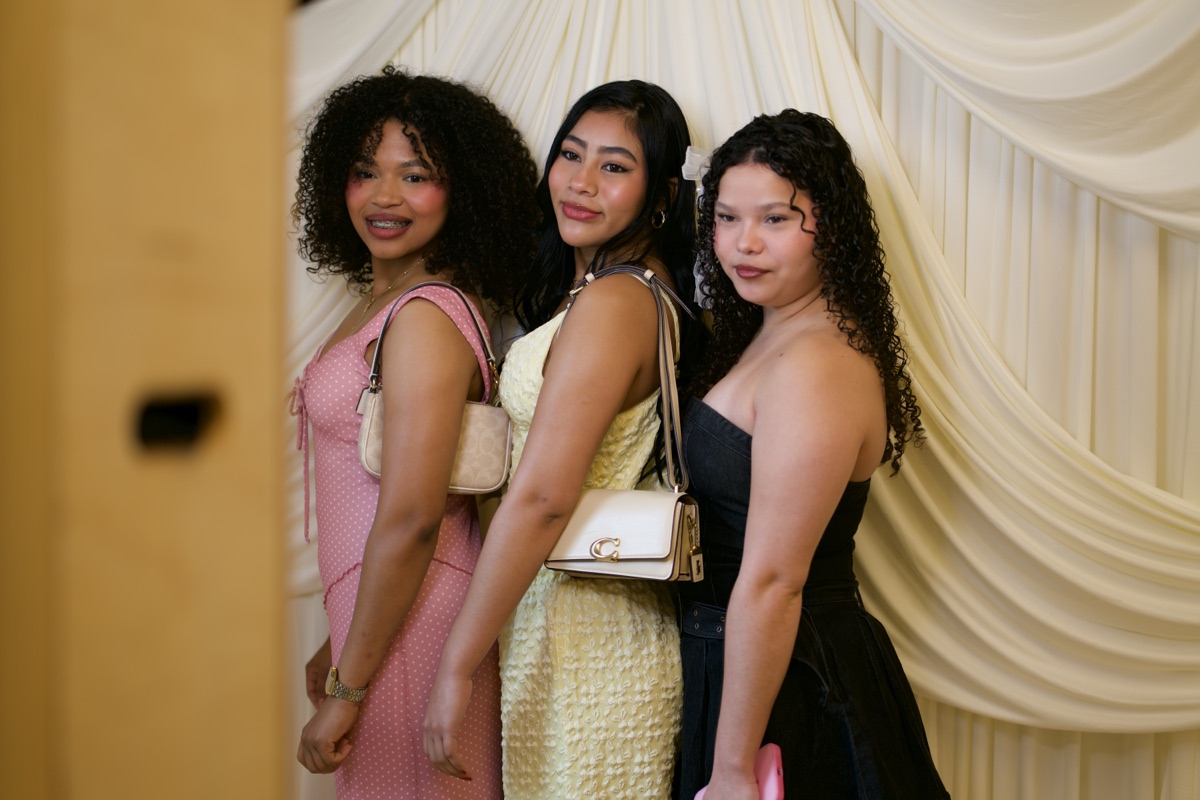 Attendees posing together at a company event